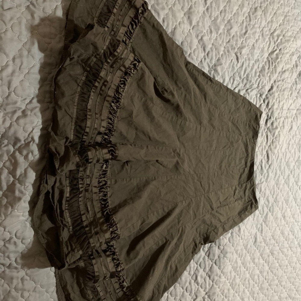 Black skirt with ruffles at the bottom.